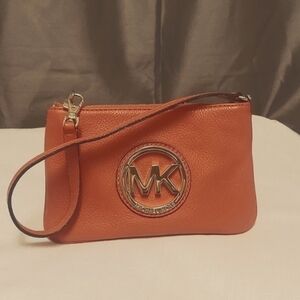 MICHAEL KORS Fulton Pebbled Leather Orange Gold Wristlet.